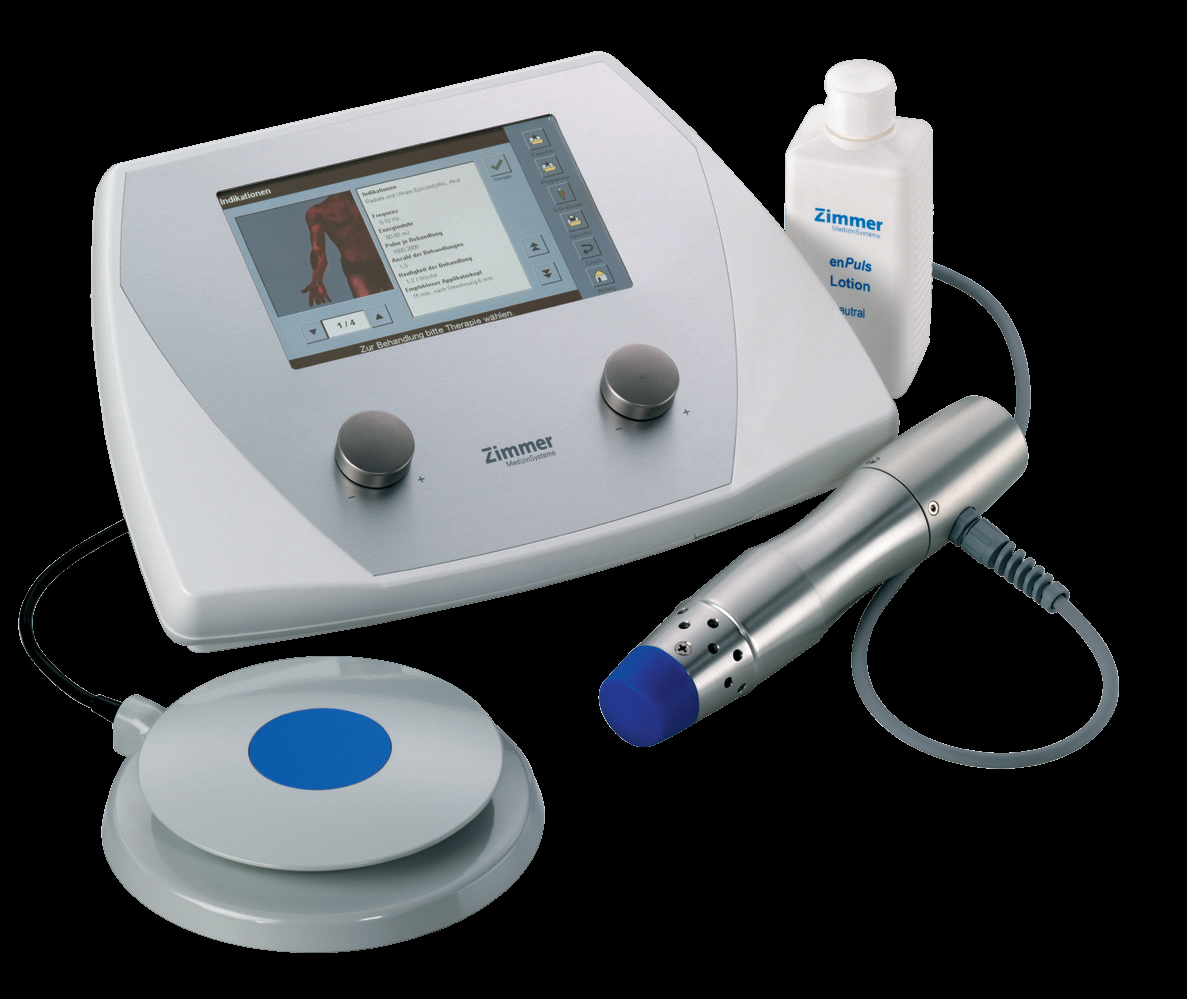 The image shows a medical device, possibly an ultrasound machine, with a probe and a control panel, accompanied by a bottle of what appears to be ultrasound gel and a syringe, all set against a plain background.